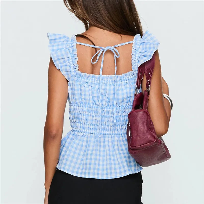 Blue gingham peplum top with ruffled sleeves for casual outings