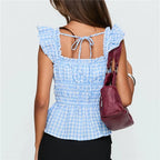 Blue gingham peplum top with ruffled sleeves for casual outings