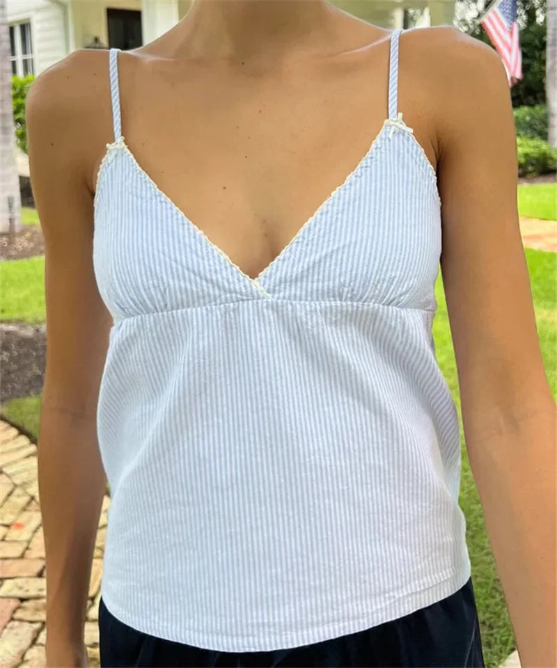 Women's blue and white striped peplum top, perfect for casual outings