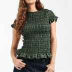 Women's green peplum top, smocked design for casual outings
