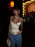 Stylish cream peplum top, elegant and perfect for nights out