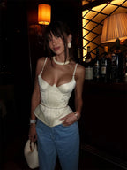Stylish cream peplum top, elegant and perfect for nights out