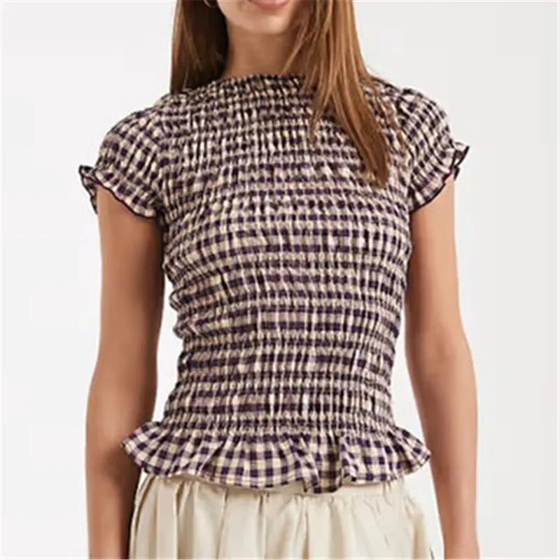 Women's peplum top in plaid, perfect for casual outings