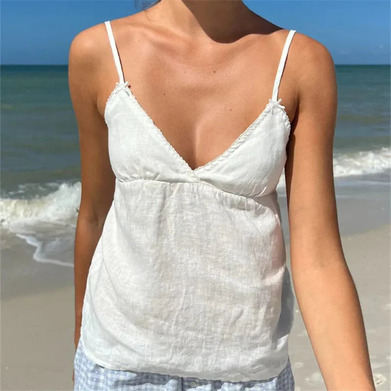 Women's white linen peplum top, perfect for beach outings