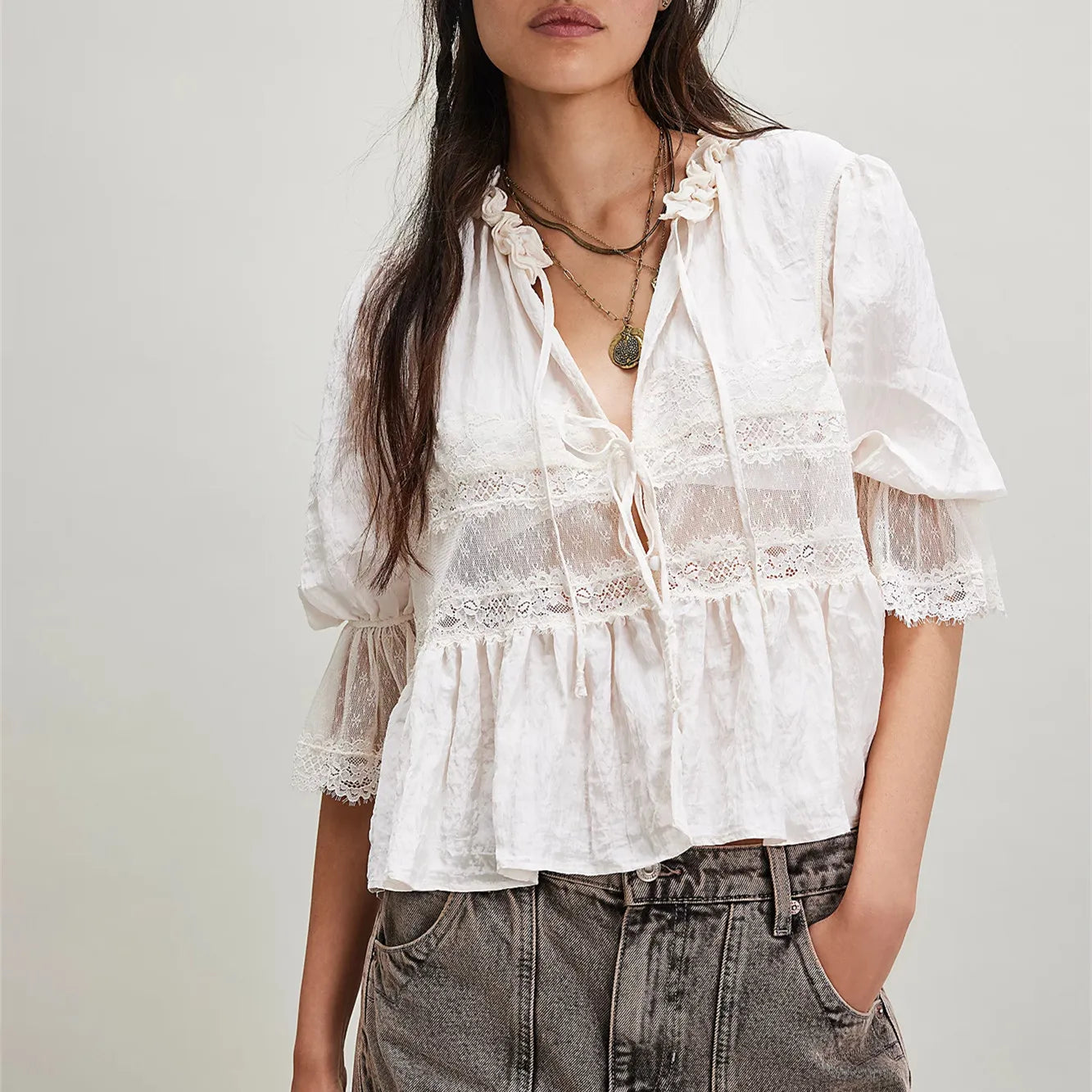 Women's white peplum tops with lace detailing for casual wear