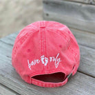 Ocean and 7th pigment dyed cap in coral color with cute bare feet design on the back