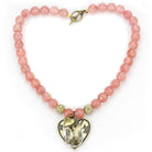 Pink beaded heart pendant necklace from VacationGrabs featuring sparkling accents and a toggle closure