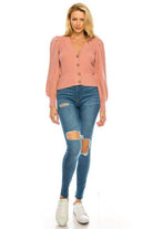 Andante USA pink cardigan for women with button closure and puff sleeves, styled with ripped jeans