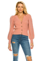 Stylish pink cardigan for women with button closure and puff sleeves, perfect for casual outings