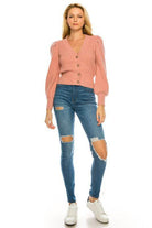 Pink cardigan for women by Andante USA styled with ripped skinny jeans for a trendy look