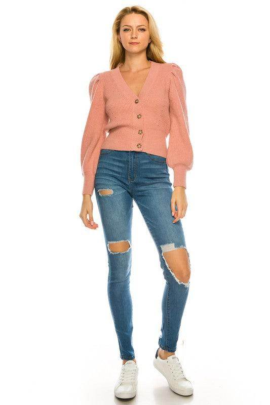 Pink cardigan for women by Andante USA styled with ripped skinny jeans for a trendy look