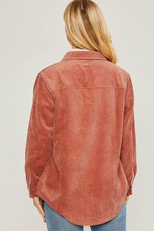 Back view of a pink corduroy jacket by Love Tree, featuring a relaxed fit and soft texture