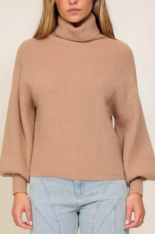 Lumiere pink cozy fall sweater with a turtleneck and puffed sleeves for a stylish look