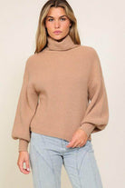 Lumiere pink cozy fall sweater with a stylish turtleneck and balloon sleeves for elegant warmth