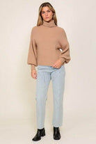 Lumiere pink cozy fall sweater featuring a relaxed fit and high neckline for comfortable styling