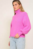 Lumiere pink cozy fall sweater with high neck and balloon sleeves for a stylish autumn look