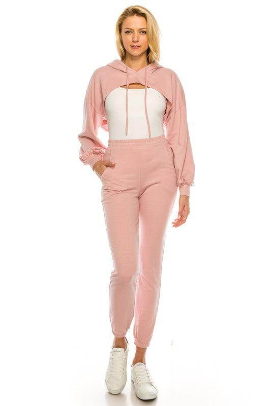 Pink crop top and bottom set by Andante USA featuring a stylish hoodie and matching joggers