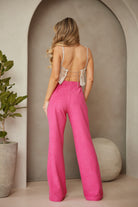 Stylish pink high rise trousers for women, perfect for summer outfits and casual occasions