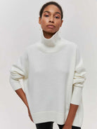 Soft white sweater styled as a pink oversized sweater for women, ideal for cozy outfits