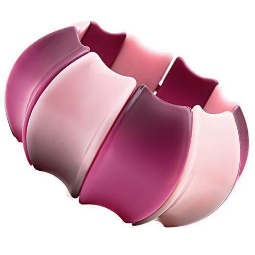 Pink resin statement bracelet featuring a unique wavy design perfect for trendy women's jewelry.
