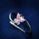 Pink stone dainty ring for women featuring a butterfly design and sparkling accents