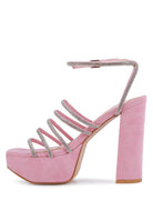 Women's pink strappy platform sandals with rhinestone accents