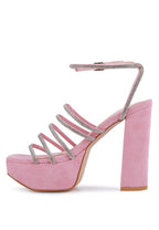 Women's pink strappy platform sandals with rhinestone accents