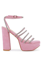 Women's pink strappy platform sandals with shimmering details