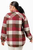 Back view of women's plaid flannel shacket for women in red and brown check pattern