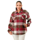 Plaid flannel shacket for women featuring a button-up design and front pockets in stylish colors