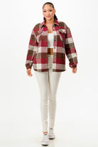 Plaid flannel shacket for women in burgundy and gray with pockets, perfect for stylish layering