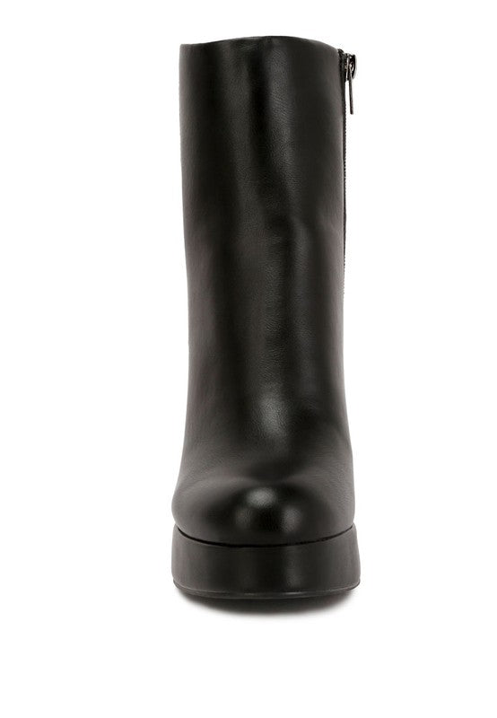 Stylish black platform ankle boots for women with a sleek design and zipper closure