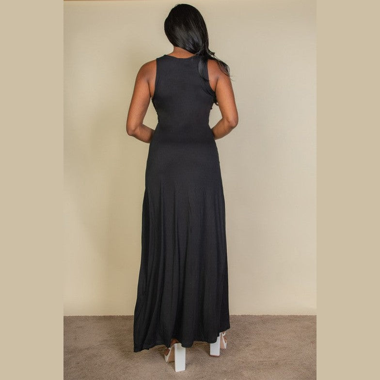 Capella women's plunge neck thigh split dress in black shown from back with sleeveless design