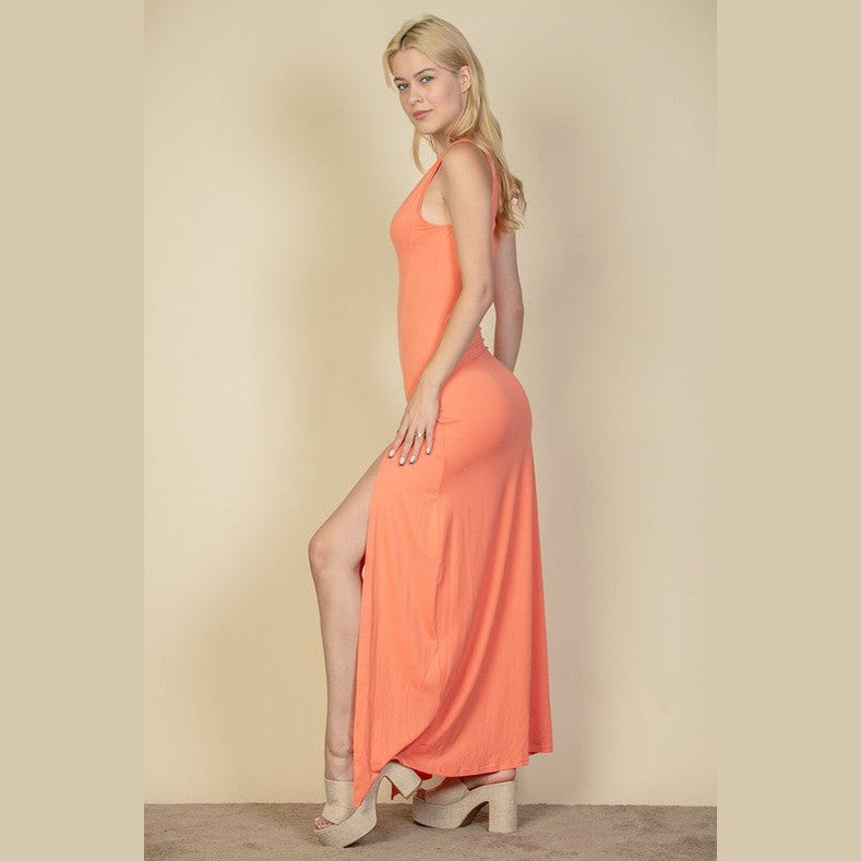 Capella women's plunge neck thigh split dress in coral orange with sleeveless design and maxi length