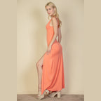 Capella women's plunge neck thigh split dress in coral orange with sleeveless design and maxi length