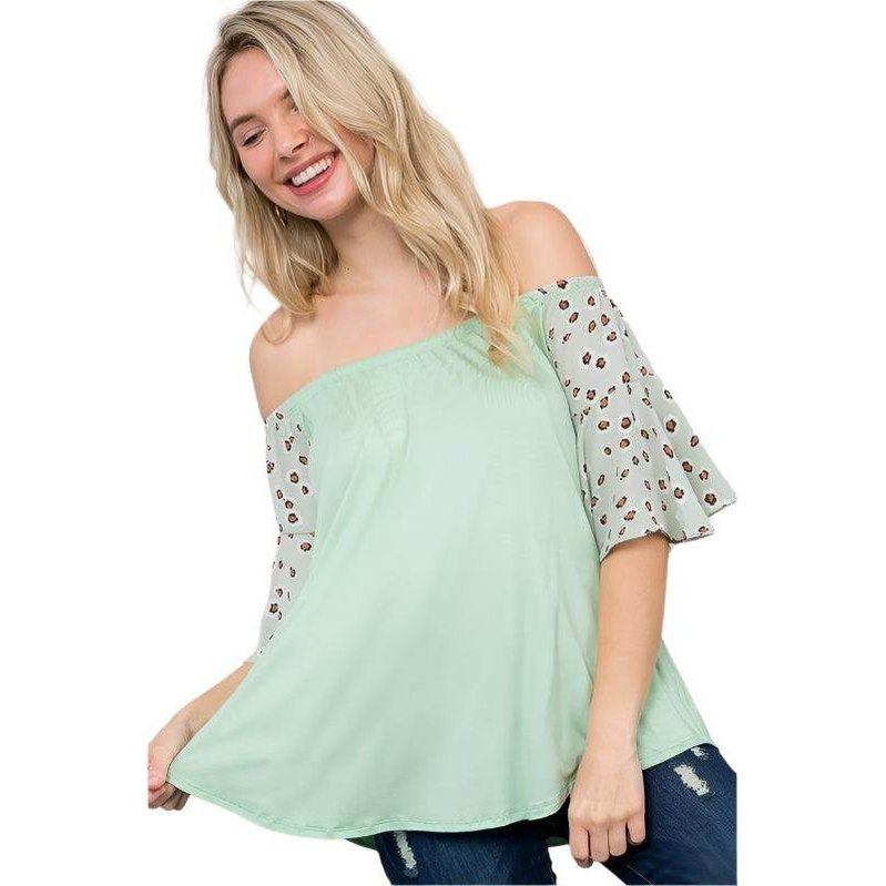 Plus size off shoulder top in soft mint green with leopard print sleeves for a stylish look