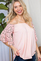 Womens plus size off shoulder top in light pink with leopard print sleeves for a stylish look