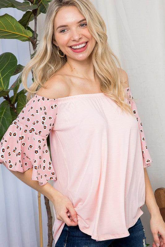 Womens plus size off shoulder top in light pink with leopard print sleeves for a stylish look