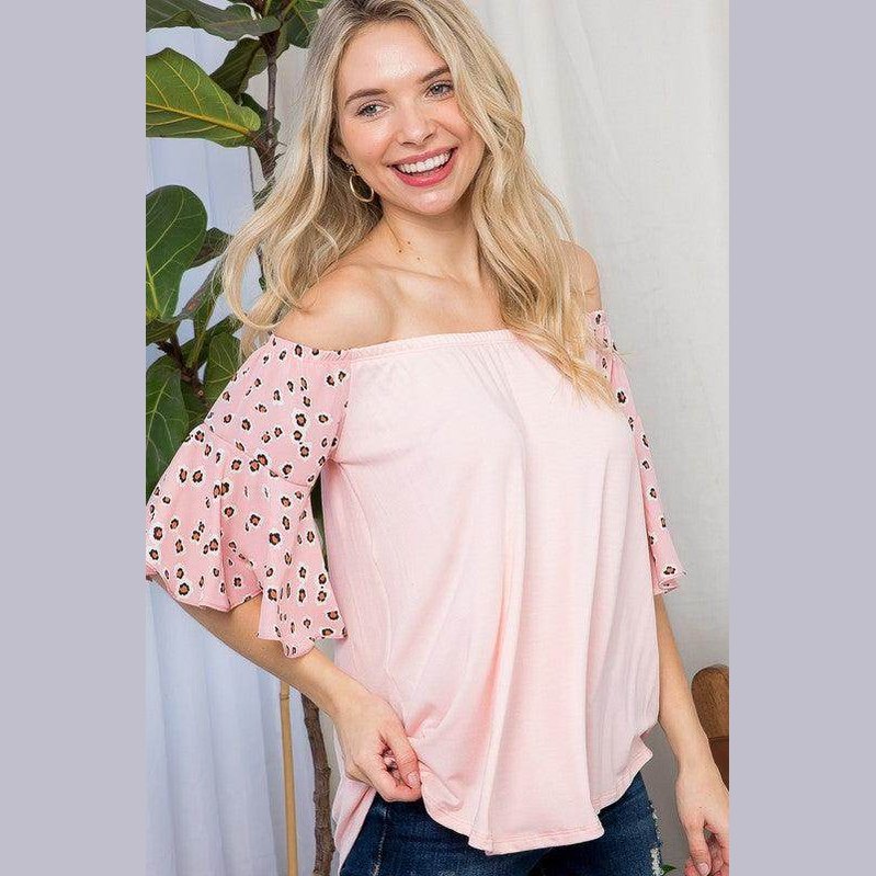 Womens plus size off shoulder top in light pink with leopard print sleeves for a stylish look