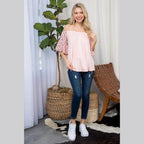e Luna plus size off shoulder top in light pink with flutter sleeves and a relaxed fit