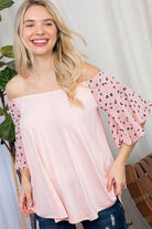 Plus size off shoulder top in pink with flutter sleeves and leopard print accents from e Luna