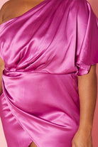 Plus size satin mini dress in vibrant pink with off-shoulder design and wrap detail