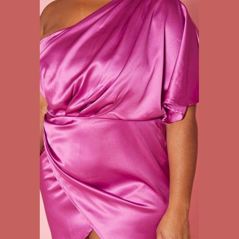 Plus size satin mini dress in vibrant pink with off-shoulder design and wrap detail