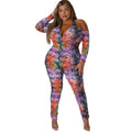 VacationGrabs plus size snake print jumpsuit with cold shoulder design and vibrant multicolor pattern