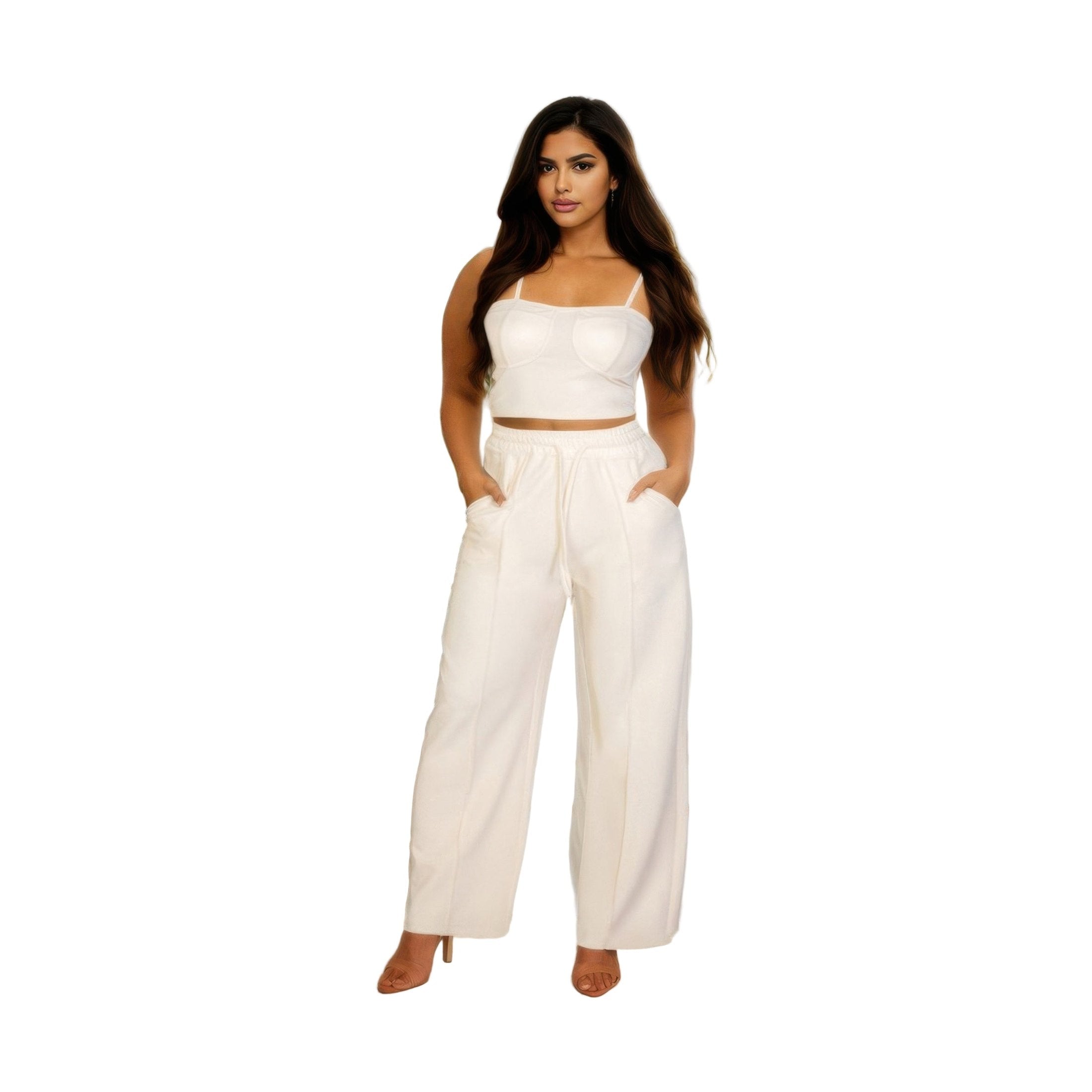 Stylish plus size vacation outfits for women featuring a chic crop top and wide-leg pants in white