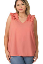 Plus size wool ruffle top in coral with stylish ruffled sleeves for a trendy look