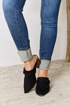 Women's black pointed toe mules for casual or dressy occasions