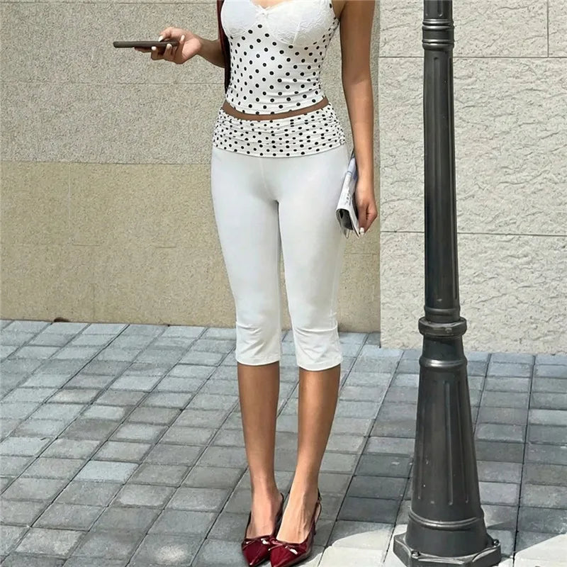 Women's white stretch pants featuring cute polka dot dots design for casual wear