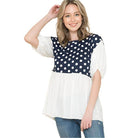 Women's polka dot tunic top with navy and white colors, featuring puff sleeves and a comfortable fit