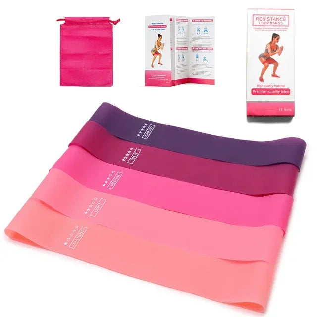 Portable resistance bands for women in pink and purple for effective workouts